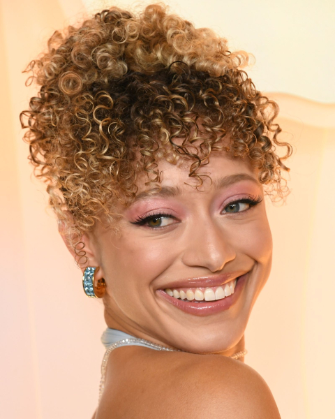 Closeup shot of Sydney Cole Alexander with cinnamon toast hair